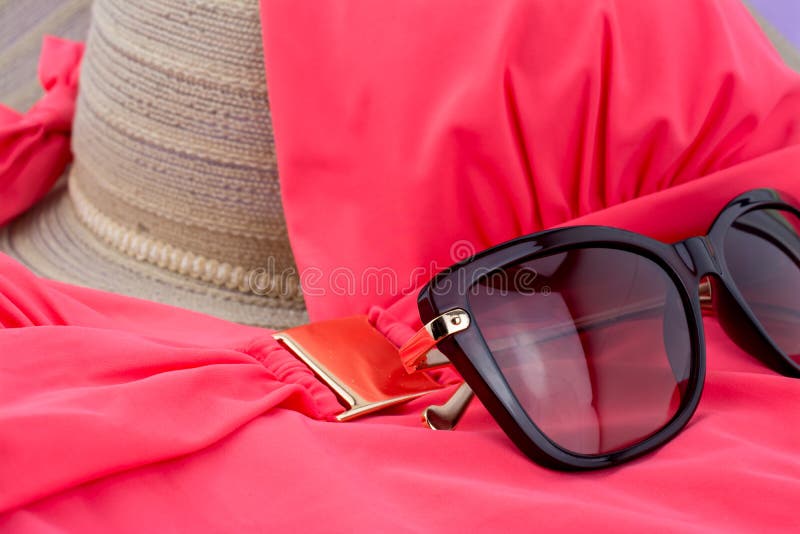 Pink Swimming Suit with Sunglasses and Hat for Summer Stock Photo
