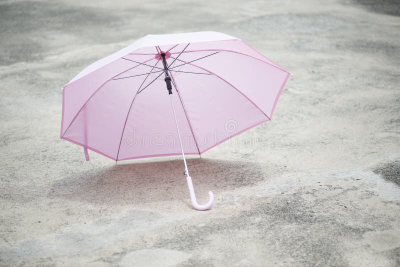 Pink Umbrella Outdoor on Concrete Floor. Stock Photo Image of fashion