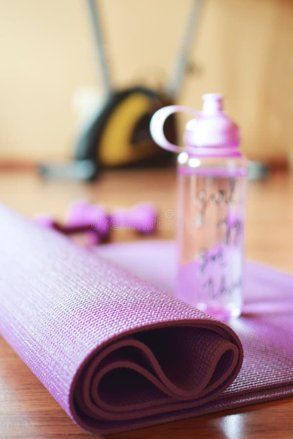 Pink Water Bottle and Violet Yoga Mat Stock Photo - Image of orange ...