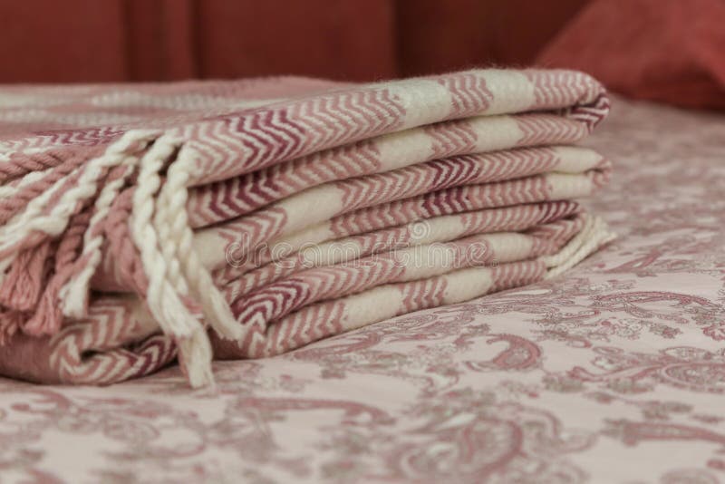 Pink and white blanket on the bed. royalty free stock photos Pink and white blanket on the bed. royalty free stock photos