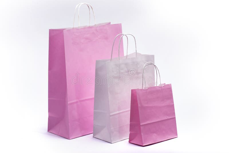 Pink. White paper bag with handles for shopping