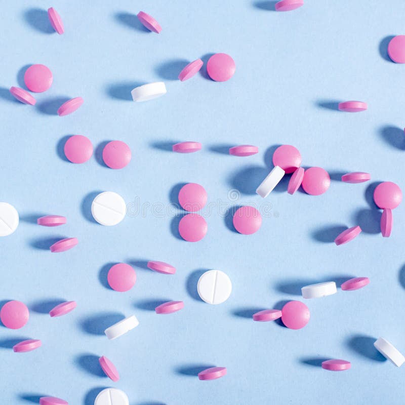 Pink and white pills stock image. Image of healthy, cure 119927337