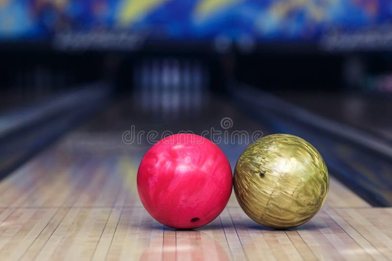 Pink and Yellow Ball on Bowling Lane before Hit Stock Image Image of