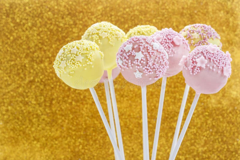 Pink and Yellow Cake Pops Decorated with Sprinkles. Stock Image Image