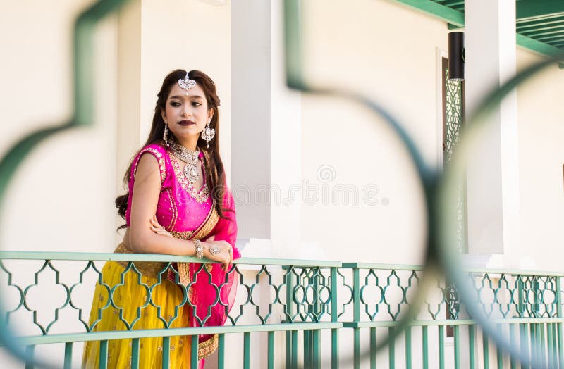 https://thumbs.dreamstime.com/b/pink-yellow-indian-costume-beautiful-girl-face-partially-covered-saree-portrait-woman-sari-dress-pink-yellow-157623745.jpg