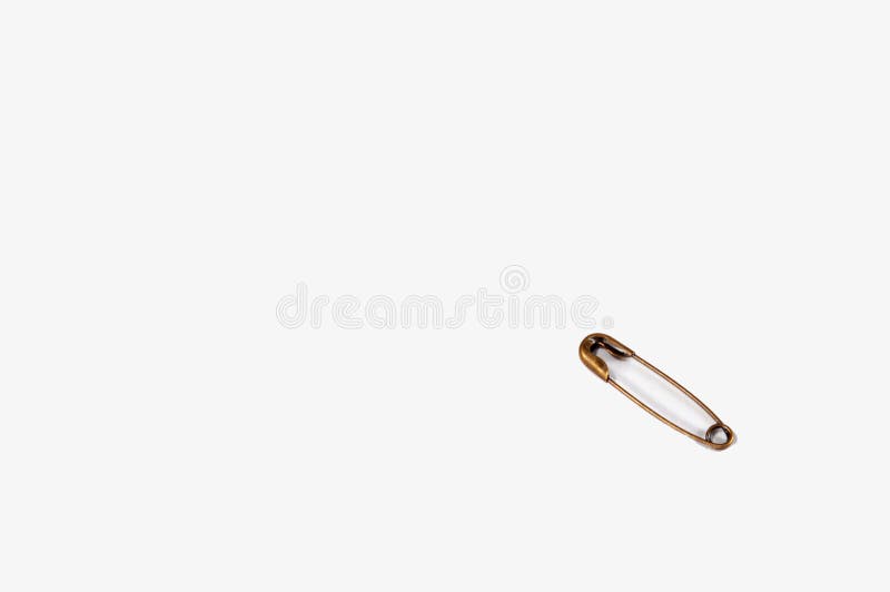 Pino de segurança com fundo branco imagem de stock Pino de segurança com fundo branco imagem de stock
