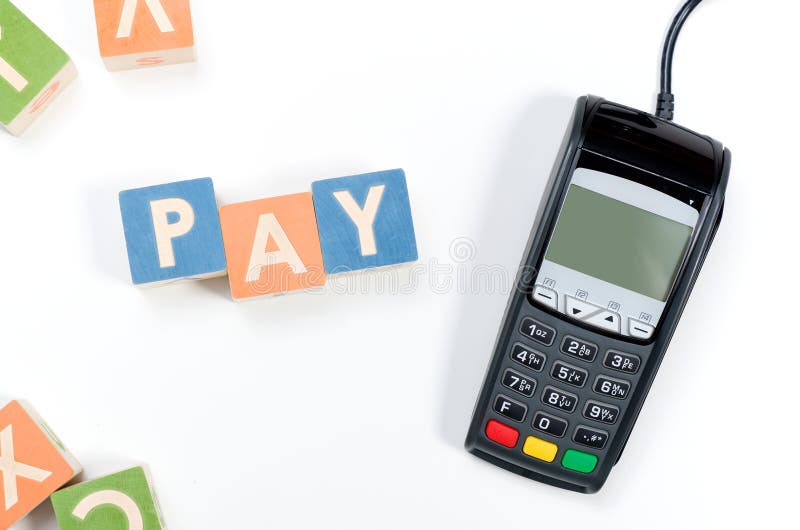 Pinpad pos terminal device and toy blocks concept royalty free stock image Pinpad pos terminal device and toy blocks concept royalty free stock image