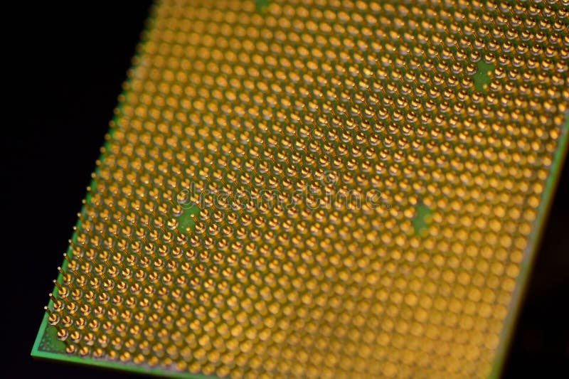 Pins of central processor unit. CPU close-up. Bottom side royalty free stock image