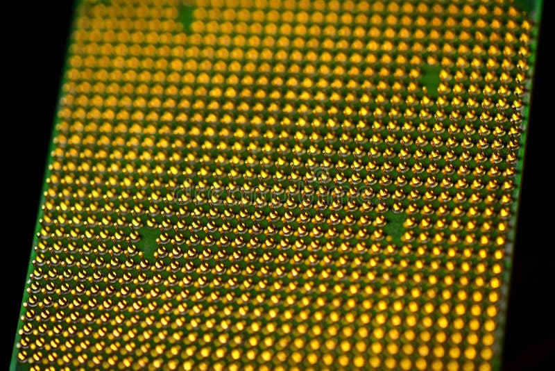 Pins of central processor unit. CPU close-up. Bottom side royalty free stock image