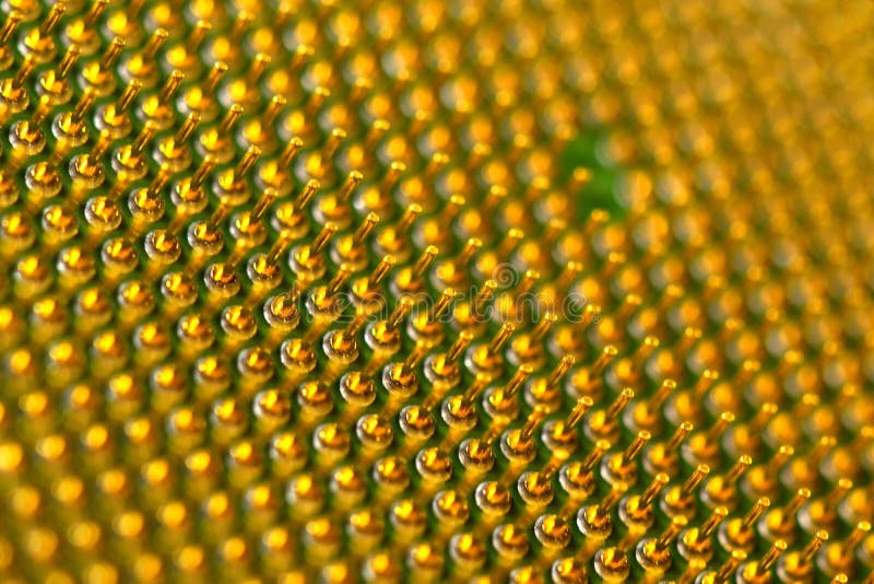 Pins of central processor unit. CPU close-up. Bottom side stock photo