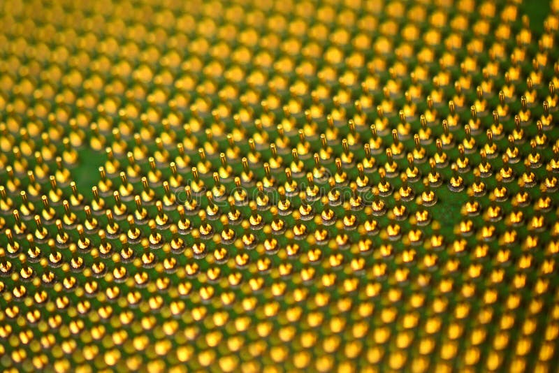 Pins of central processor unit. CPU close-up. Bottom side royalty free stock photo