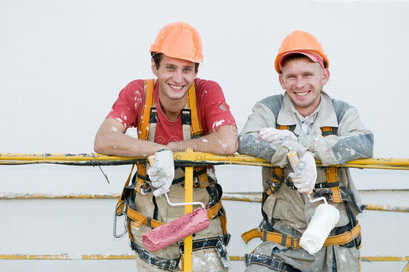 Pintores felizes da fachada do construtor