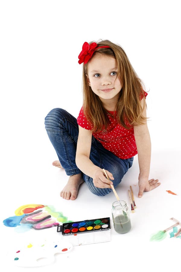 Pintura de la niña con las acuarelas fotografía de archivo libre de regalías Pintura de la niña con las acuarelas fotografía de archivo libre de regalías