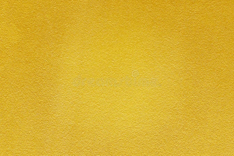 Pintura del oro en fondo áspero de la textura de la pared del cemento imagen de archivo Pintura del oro en fondo áspero de la textura de la pared del cemento imagen de archivo