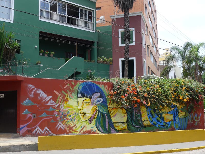Pintura moderna em uma parede vermelha em Barranco, Lima imagem de stock Pintura moderna em uma parede vermelha em Barranco, Lima imagem de stock
