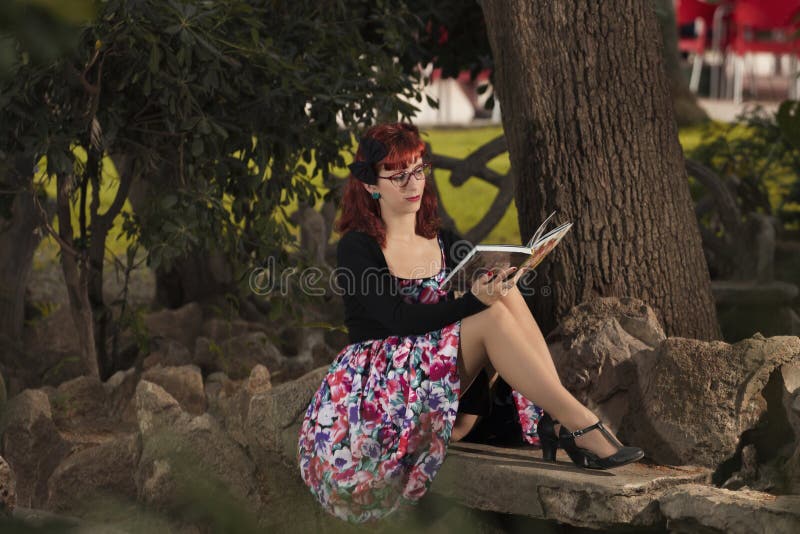 Pinup young woman in vintage style clothing