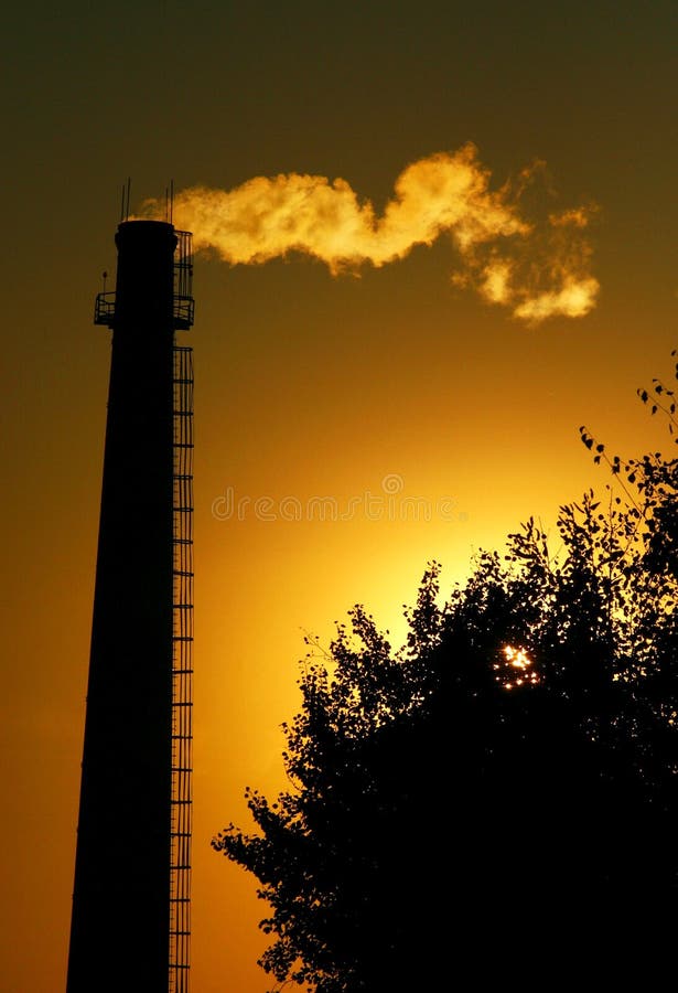 Pipe with a smoke on a decline. Power decrease stock images, royalty-free photos and pictures
