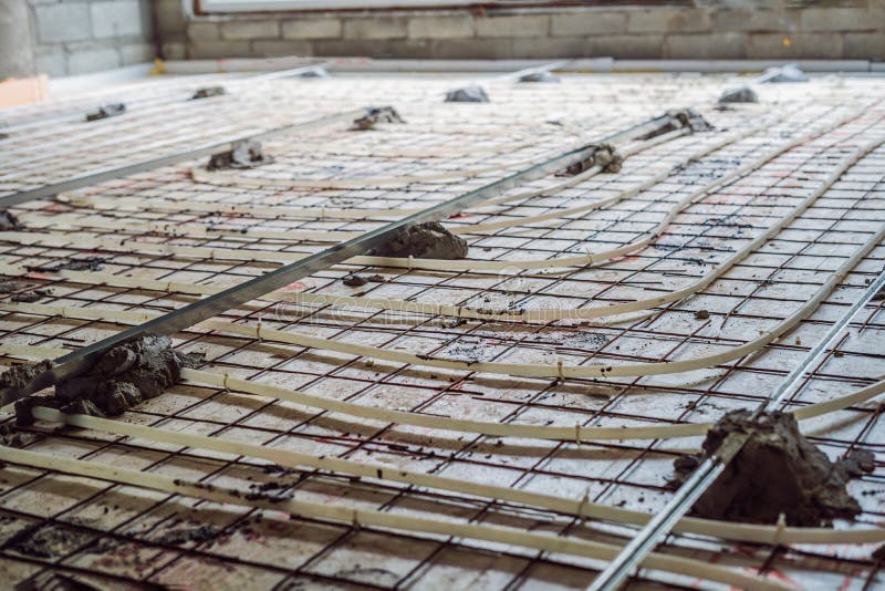 Pipe Fitter Mounted Underfloor Heating. Heating System and Underfloor