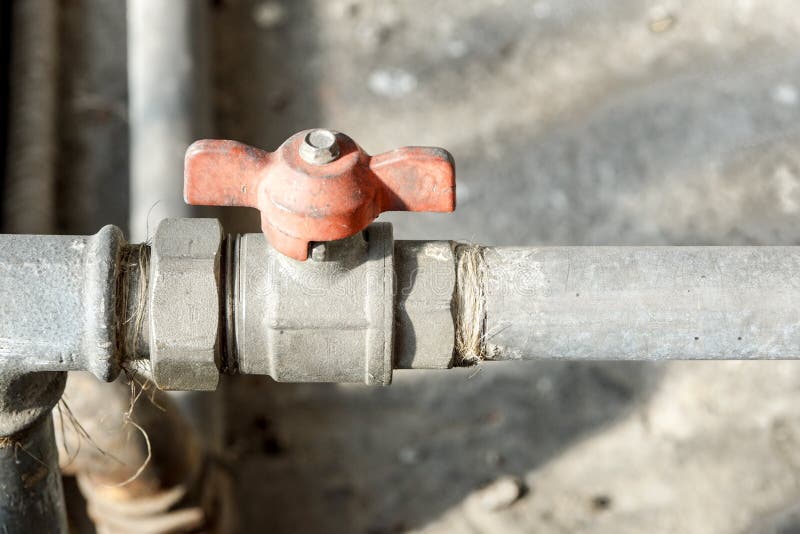 Pipe off the water supply, both old rust corrosion stock images