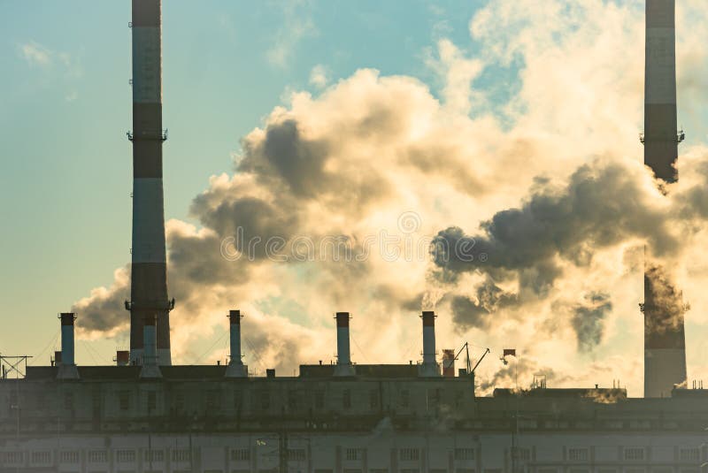 Pipes with smoke: industrial production, plant, air pollution royalty free stock photography
