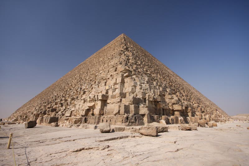 Great pyramid - Giza, Egypt, blue sky. Great pyramid - Giza, Egypt, blue sky