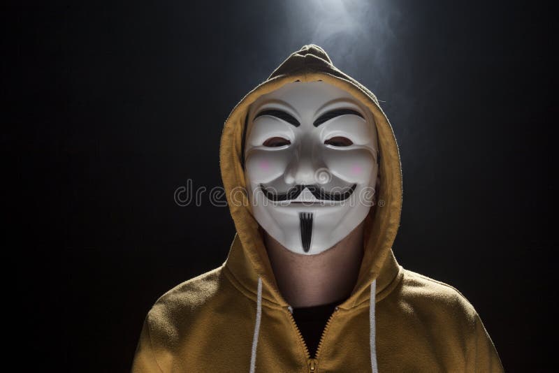 Anonymous activist hacker with mask a studio shot. Anonymous activist hacker with mask a studio shot