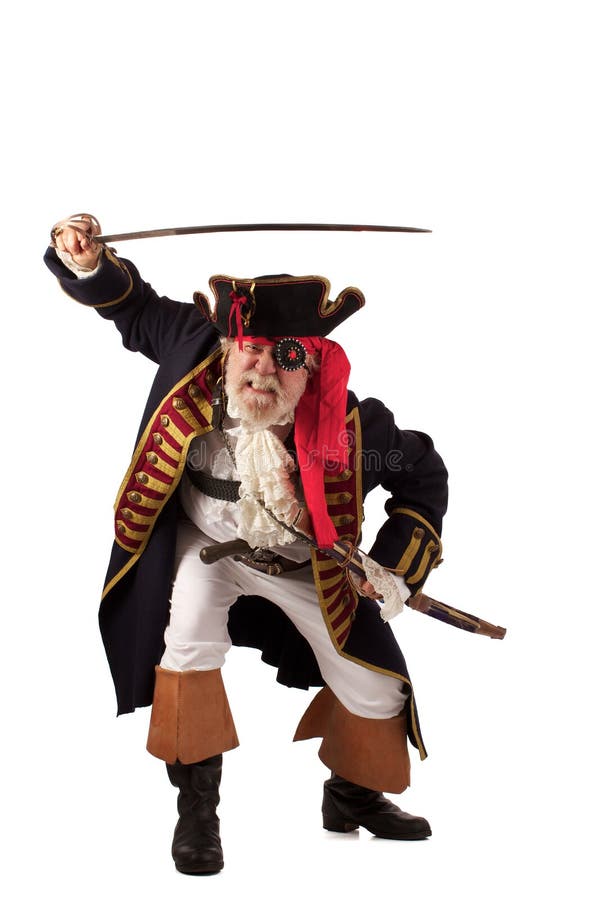 Pirate lunges forward with raised sword stock photo