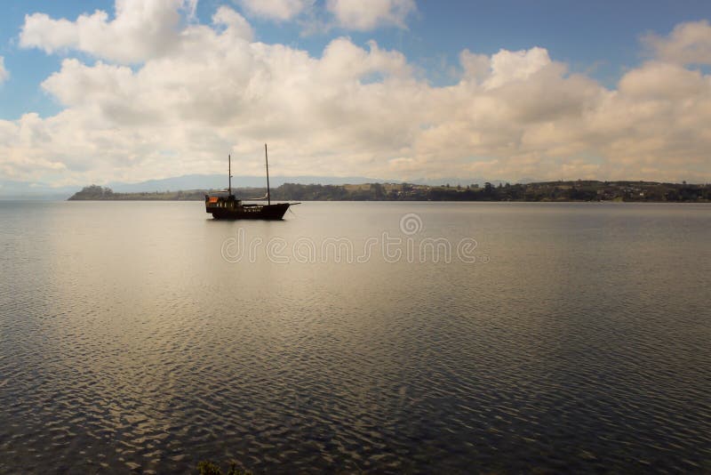 Pirate Ship. Calm in the Bay with Some Clouds in the Sky Stock Image