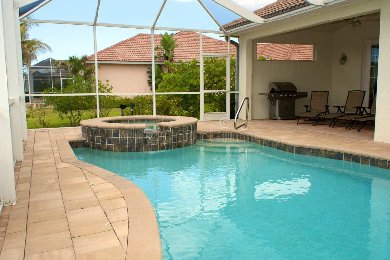 Piscine et zone de séance photo stock Piscine et zone de séance photo stock