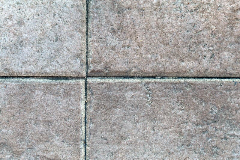 Piso europeo meridional hecho de Grey Tiles fotografía de archivo libre de regalías Piso europeo meridional hecho de Grey Tiles fotografía de archivo libre de regalías
