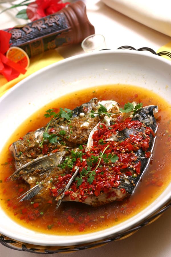 Pista tratada con vapor de los pescados con pimienta tajada imagen de archivo libre de regalías Pista tratada con vapor de los pescados con pimienta tajada imagen de archivo libre de regalías