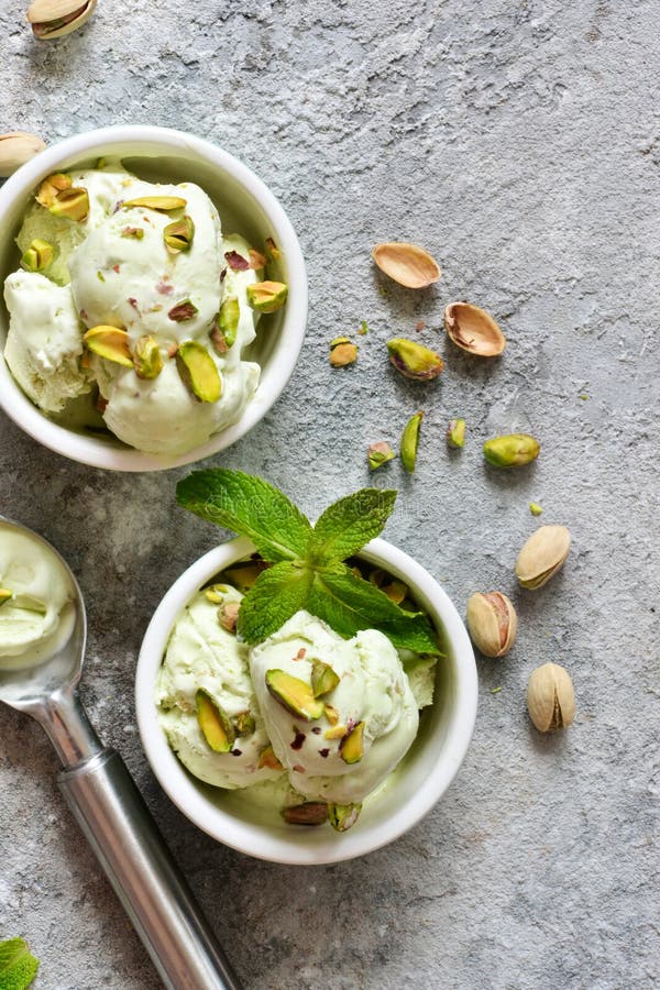 Pistachio Ice Cream with Mint on a Stone Background. Green Ice Cream