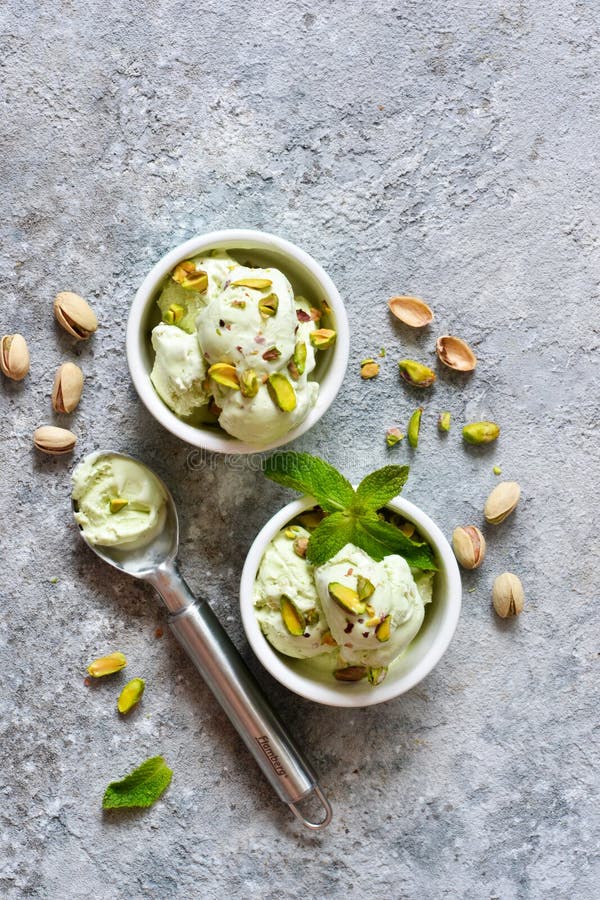 Pistachio Ice Cream with Mint on a Stone Background. Green Ice Cream