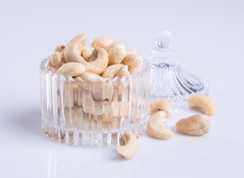 Pistachio Nut in Glass Bowl on a Background. Stock Photo Image of