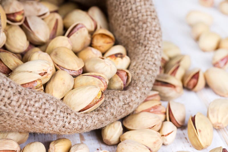 Pistachio nuts in a bag stock photo. Image of green, studio 34277460