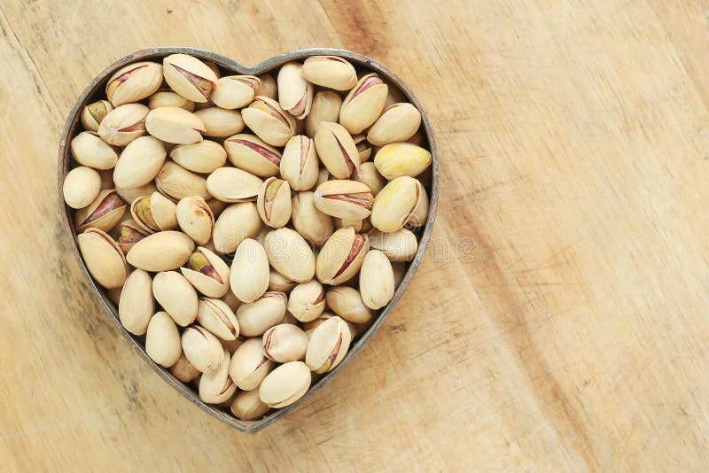 Pistachio Nuts in Heart Shape Stock Image Image of wood, pistachios