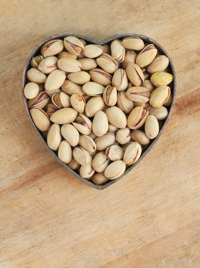 Pistachio Nuts in Heart Shape Stock Photo Image of salted, open 55950080