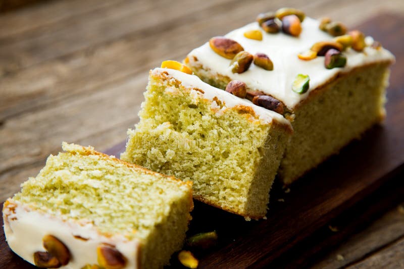 Pistachio Sponge Cake Covered in Icing Sugar. Stock Image Image of
