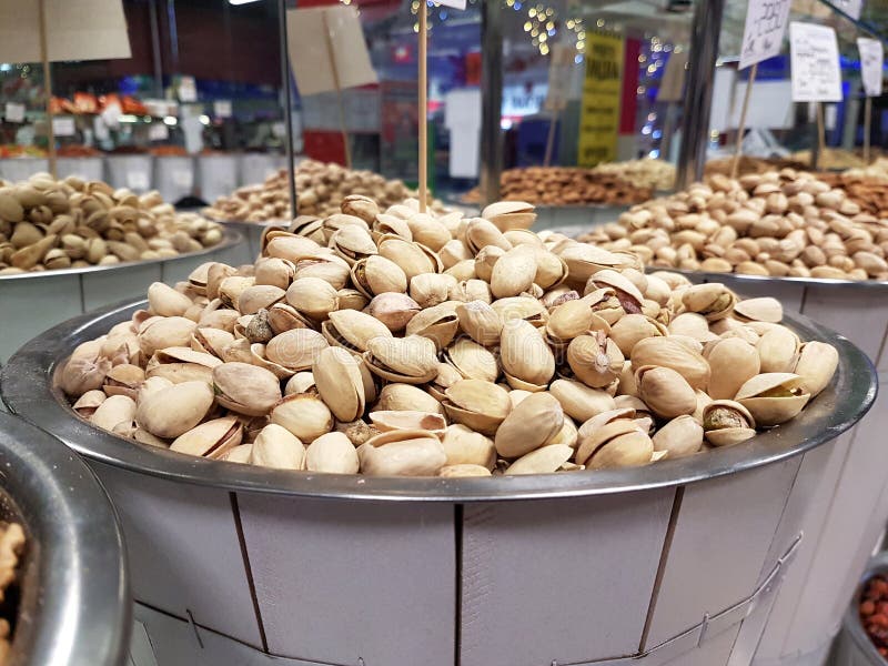Pistachios in the market stock image. Image of nutrition 135288179