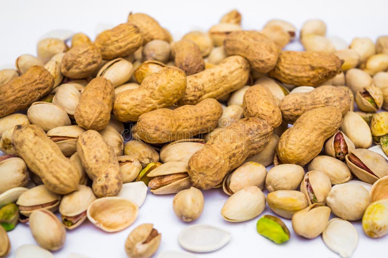 Pistachios and Peanuts stock image. Image of walnut 161855327