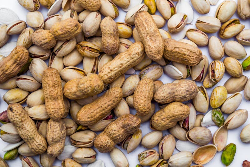 Pistachios and Peanuts stock photo. Image of diet, bowl 161815936