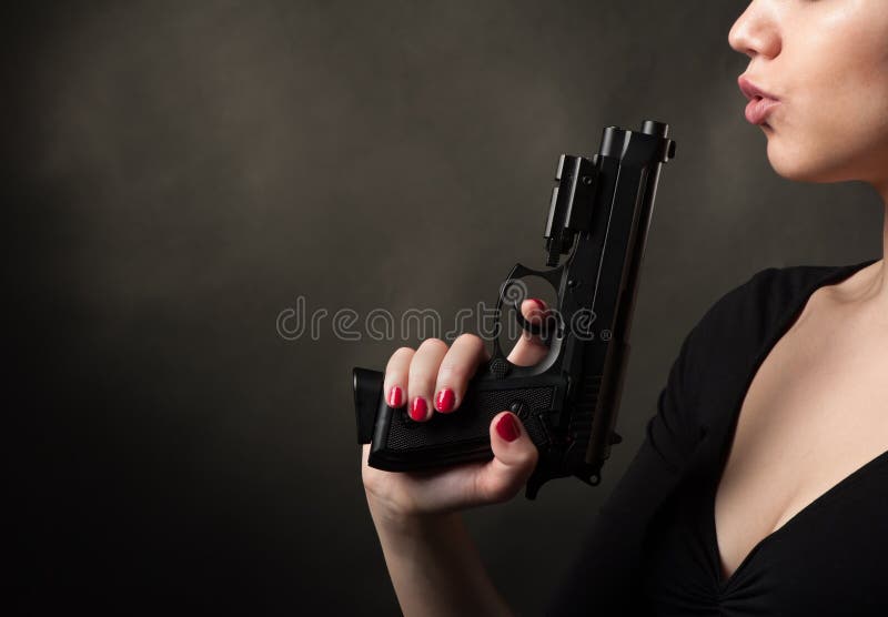 Pistol in female arm