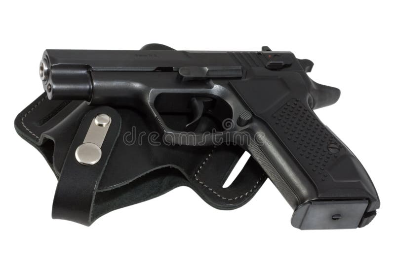 The automatic pistol lays on holster black color. The automatic pistol lays on holster black color.