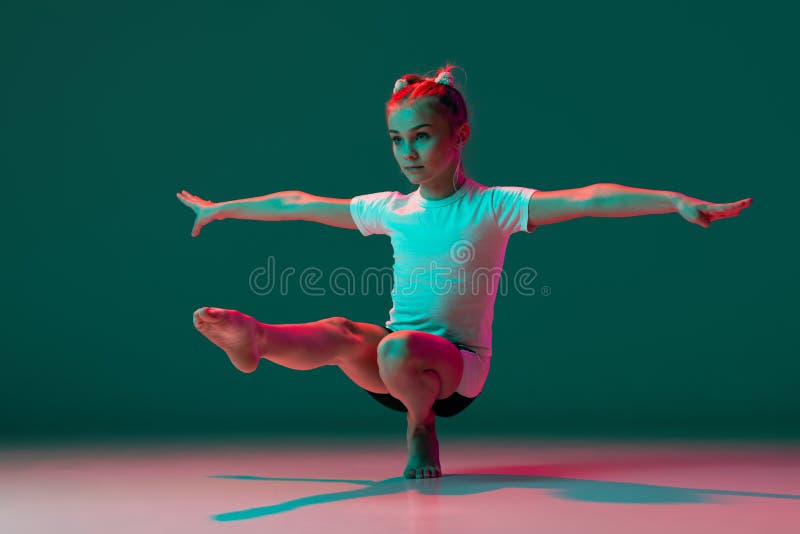 Girl with a Rhythmic Gymnastics Clubs.Flexibility in Acrobatics Stock Image  - Image of charming, colorful: 130603401