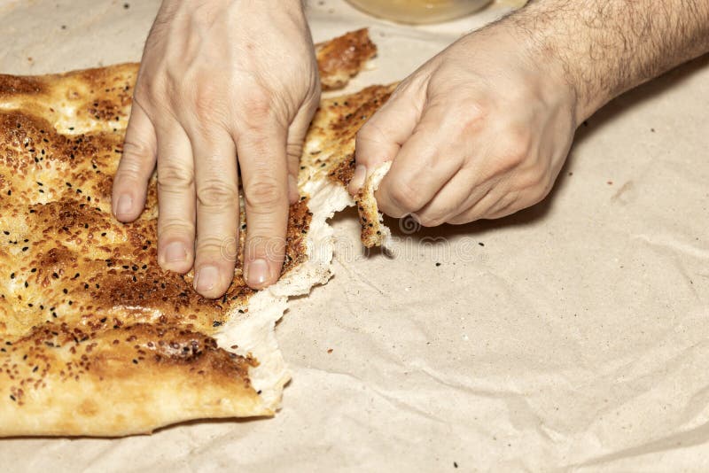 Pita Bread, Bakeries in Ramadan. it is Eaten by Hand Plucking Stock