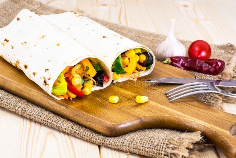 Pita Bread, Shawarma, Burritos with Vegetables and Corn Stock Image