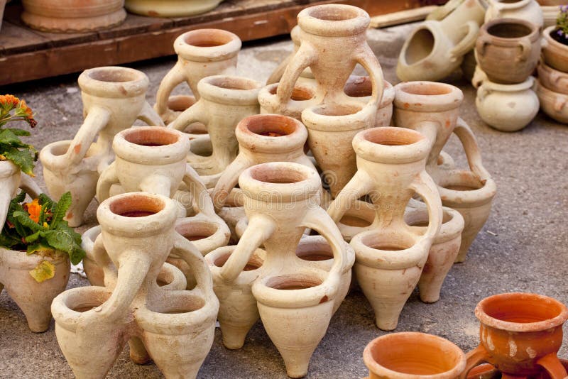 Pitchers and jars of clay stock photo. Image of flower 24527708
