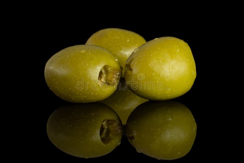 Pitted Green Olive Isolated on Black Glass Stock Photo Image of