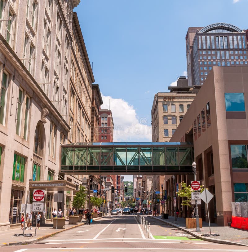 Pittsburgh, Pennsylvania, USA June 6, 2021 An elevated cross walk over Penn avenue as seen from the intersection with Stanwix street in downtown Pittsburgh.