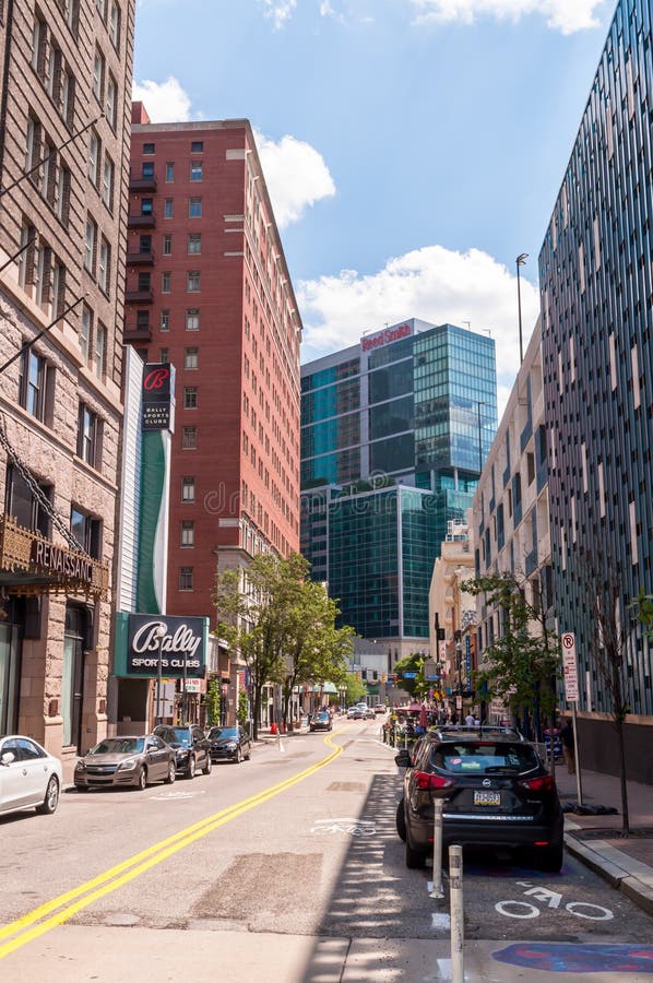 Pittsburgh, Pennsylvania, USA June 6, 2021 Parked cars and building along 6th street in downtown Pittsburgh on a sunny spring day.